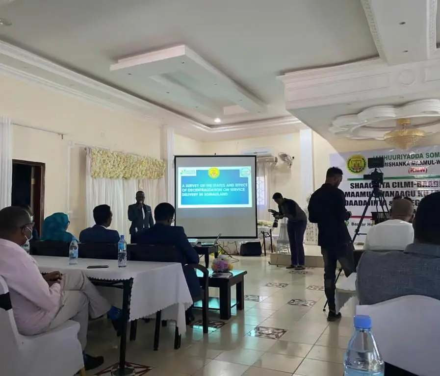 An SCF training workshop in progress, with participants facing a projected presentation